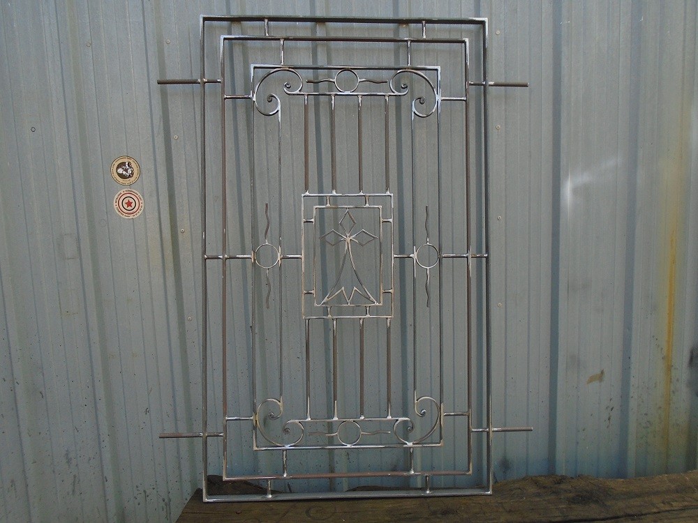 Grille de defense en fer forgé