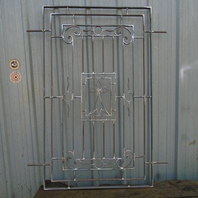 Grille de defense en fer forgé