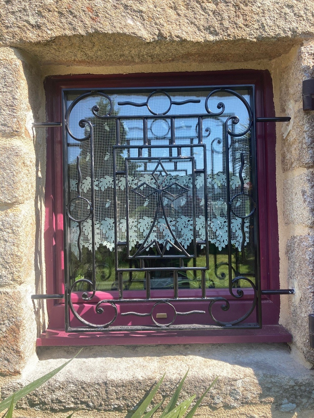 Grille de defense en fer forgé